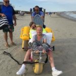 smile mass beach wheelchair in use